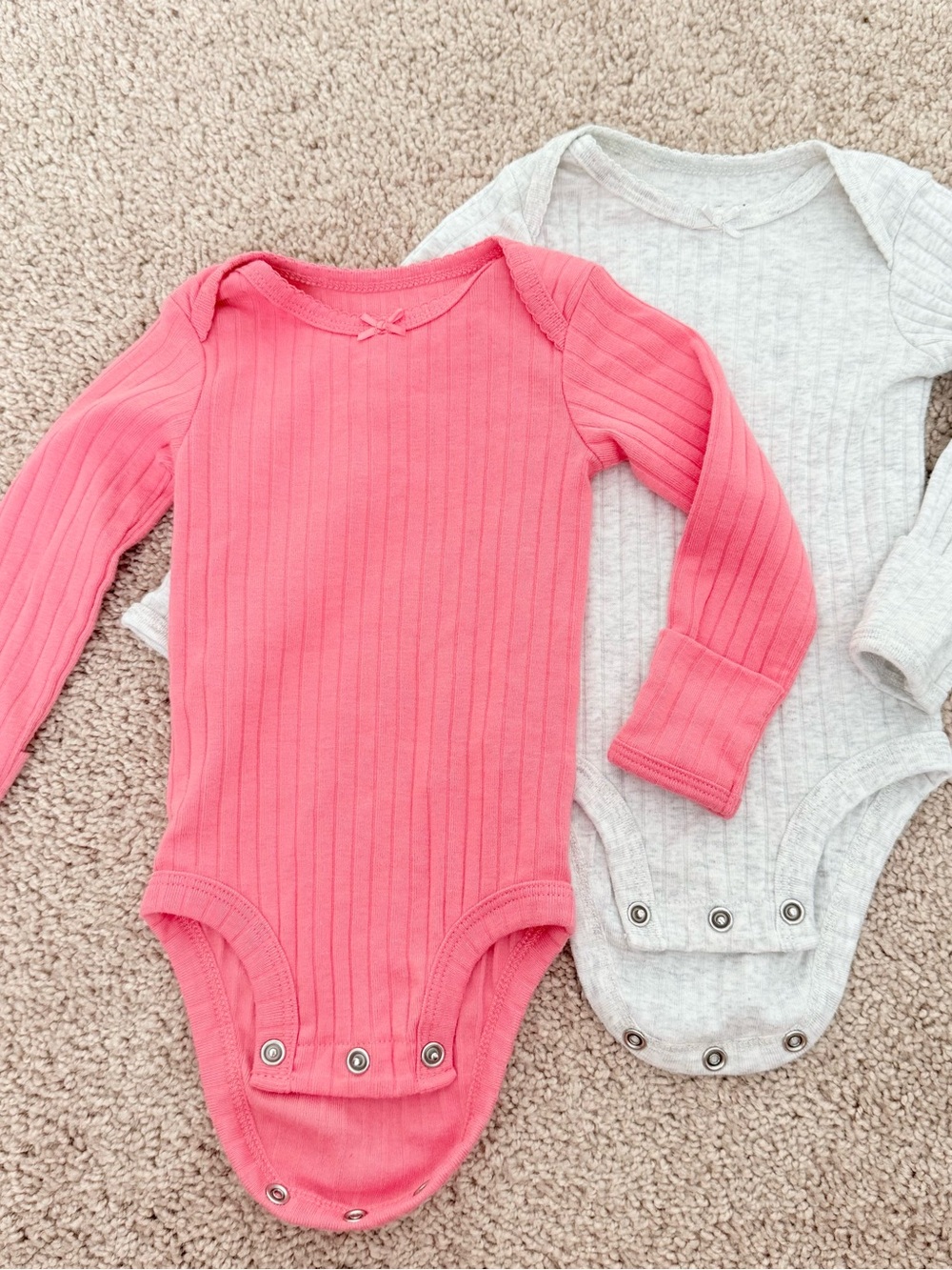 Carter’s 0-3mo Long-Sleeve Ribbed One-Piece Bodysuit in Pink